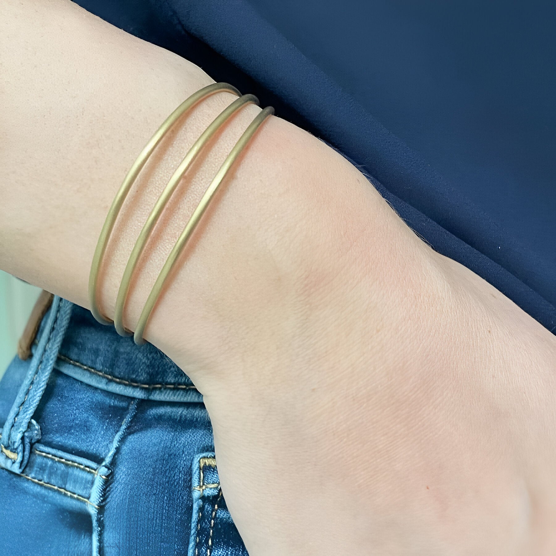 Susi Cala Armreif London Triple Bangle, vergoldet