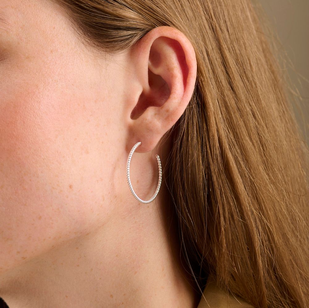 Pernille Corydon Creolen Twisted, vergoldet