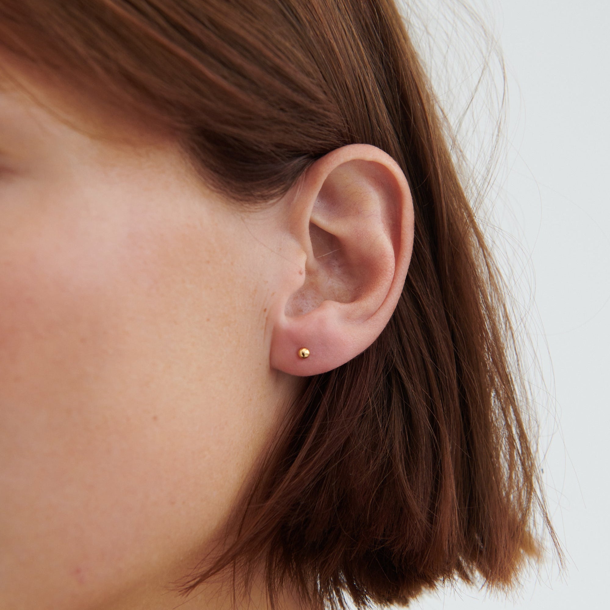 Pernille Corydon Ohrstecker Jupiter, vergoldet