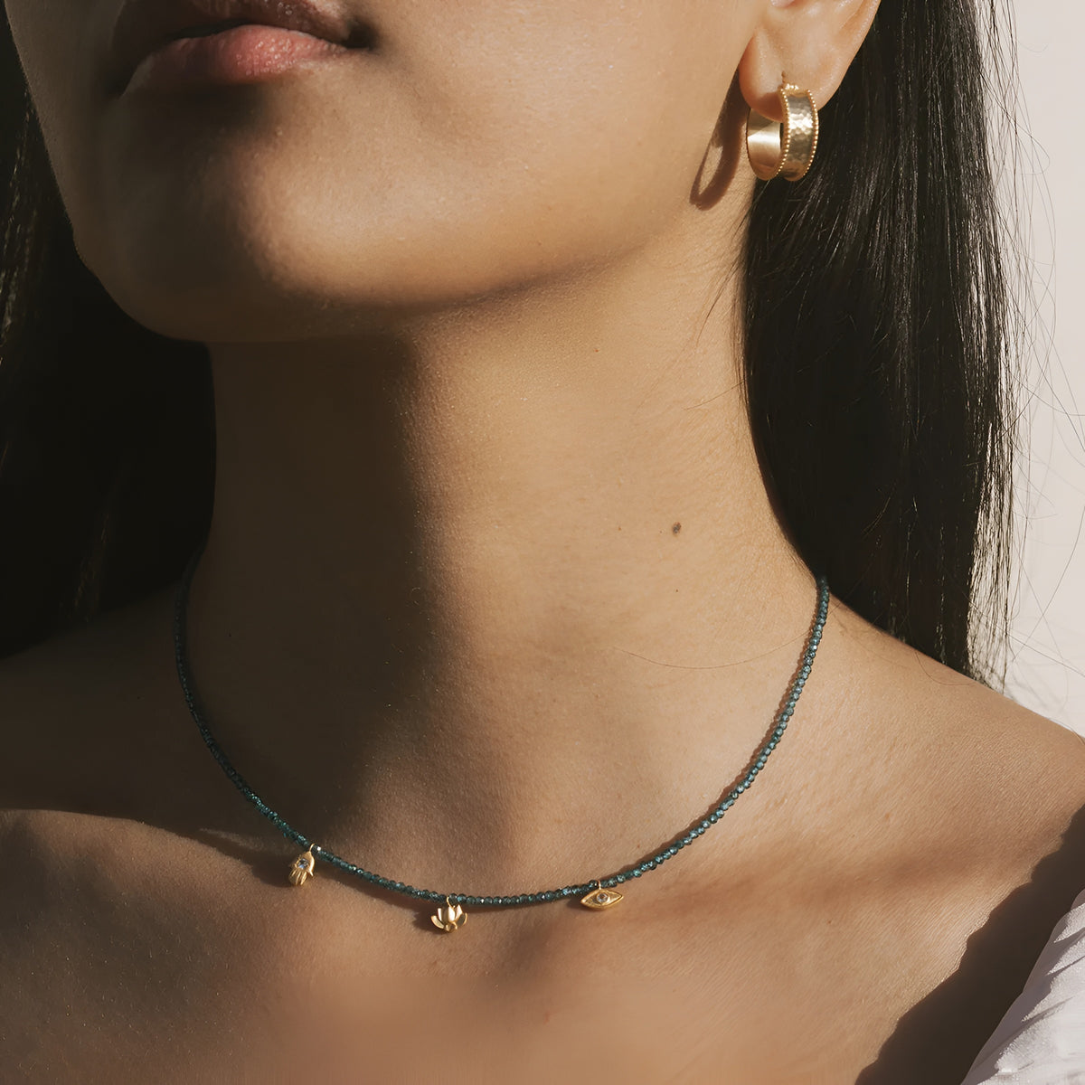Satya Jewelry Kette Find Your Center Blue Topaz Charm, vergoldet