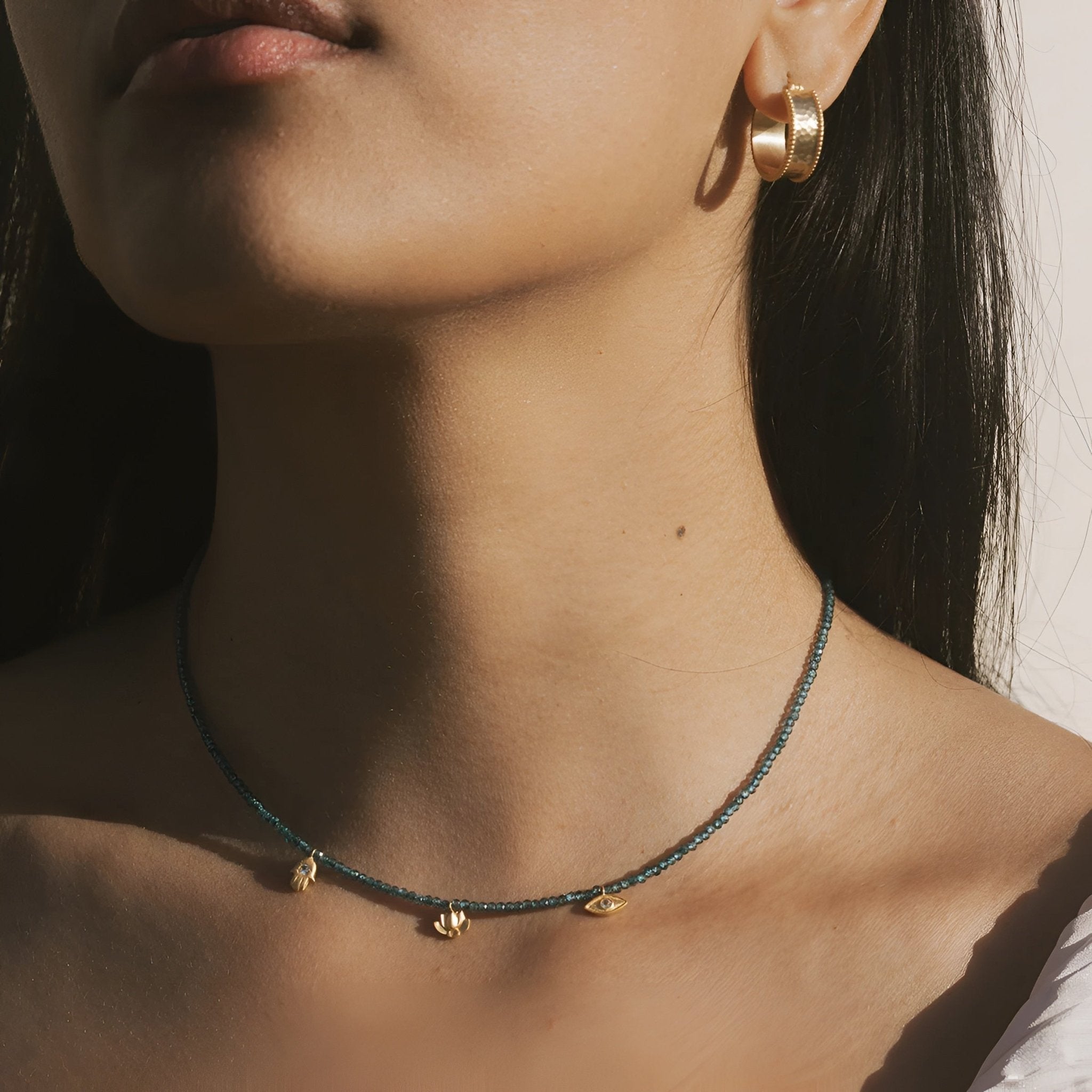 Satya Jewelry Kette Find Your Center Blue Topaz Charm, vergoldet