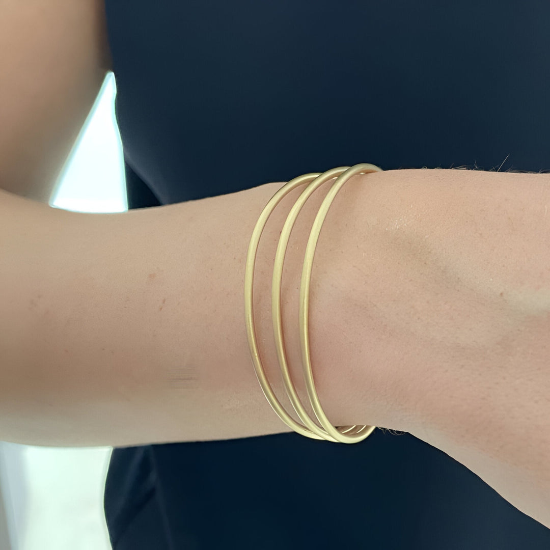 Susi Cala Armreif London Triple Bangle, vergoldet